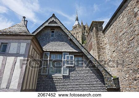 Stock Image - Houses In The Fortified Village And Abbey Of Mont-Saint-Michel, France. Fotosearch