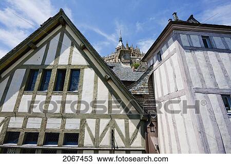 Houses In The Fortified Village And Abbey Of Mont-Saint-Michel, France View Large Photo Image Stock Image - Houses In The Fortified Village And Abbey Of Mont-Saint-Michel, France. Fotosearch