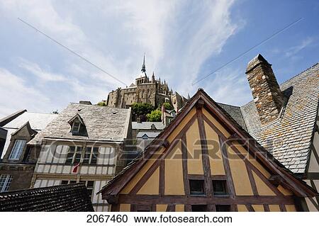 Stock Image - Houses In The Fortified Village And Abbey Of Mont-Saint-Michel, France. Fotosearch