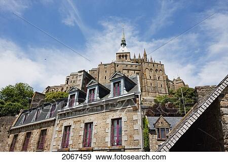 Stock Photo - Houses In The Fortified Village And Abbey Of Mont-Saint-Michel, France. Fotosearch