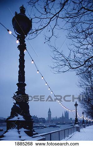Stock Photo - Houses Of Parliament And Lamp Post In The Snow. Fotosearch