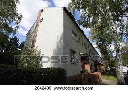 Houses On Britz Development Built In 1925, Part Of The Berlin Modernism Housing Estates, Berlin, Germany View Large Photo Image Stock Photograph - Houses On Britz Development Built In 1925, Part Of The Berlin Modernism Housing Estates, Berlin, Germany. Fotosearch