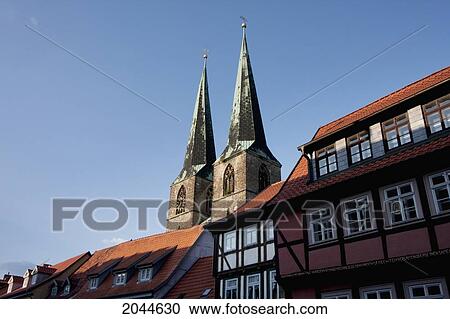 Houses On Papenstrasse And St. Nicholas Church, Quedlinburg, Germany View Large Photo Image Stock Image - Houses On Papenstrasse And St. Nicholas Church, Quedlinburg, Germany. Fotosearch