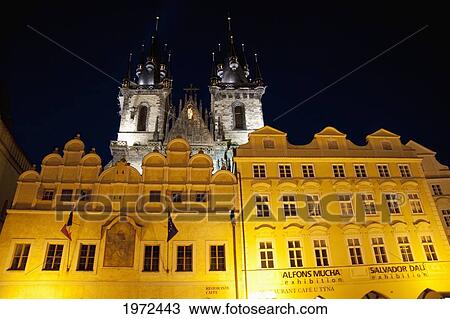 Stock Image - Houses On The Old Town Square With The Church Of Our Lady Before Tyn At Night, Prague, Czech Republic. Fotosearch