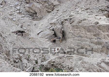 Stock Image - Houses Perched On The Indus River Gorge, Skardu, Northern Areas, Pakistan. Fotosearch