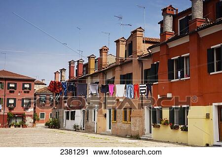 Stock Image - Houses with distinctive chimneys; Giudecca Island, Venice, Italy. Fotosearch
