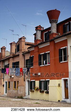 Houses with distinctive chimneys, Giudecca Island; Venice, Italy View Large Photo Image Stock Photo - Houses with distinctive chimneys, Giudecca Island; Venice, Italy. Fotosearch