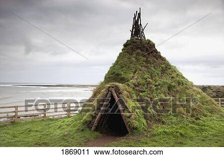 Stock Image - Howick, Northumberland, England; A Grass-Covered Shelter Shaped Like A Teepee. Fotosearch