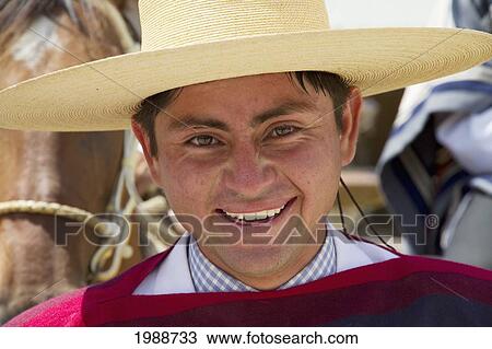 Stock Image - Huaso Wearing A Chupalla (Straw Hat) At Estancia El Cuadro, Casablanca Valley, Valparaiso Region, Chile. Fotosearch