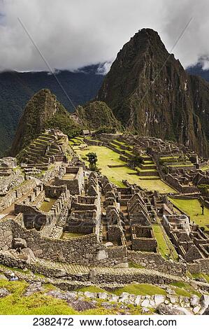 Huayanapichu (young mountain) in the distance at Machu Picchu, the ancient lost city of the Incas, one of Peru's top tourist destinations; Peru View Large Photo Image Stock Image - Huayanapichu (young mountain) in the distance at Machu Picchu, the ancient lost city of the Incas, one of Peru's top tourist destinations; Peru. Fotosearch