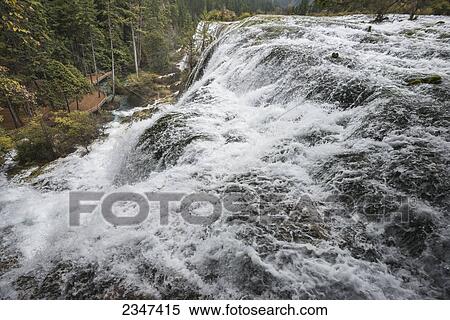 Stock Photography - Huge Waterfall Cascade In Jiuzhaigou Valley National Park; Jiuzhaigou, Sichuan, China. Fotosearch