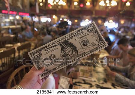 Stock Image - Human Hand Holding Menu Inside The Big Texan Steak Ranch Restaurant, Amarillo, Texas, Usa. Fotosearch