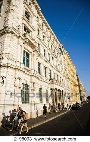 Stock Image - Hungary, Sundrenched historic building on southside of river Danube; Budapest. Fotosearch