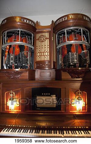 Stock Photo - Hupfeld Phonoliszt Violina With 6 Violins On Display At Siegfried's Mechanical Music Cabinet At Rudesheim In Hessen, Germany. Fotosearch