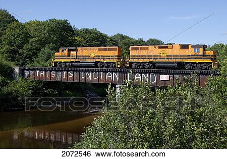 Huron Central Railway Train On Its Way To Sault Sainte Marie, Crossing Bridge Over Garden River With Graffiti Stating This Is Indian Land, Garden River First Nation Community, Ontario View Large Photo Image Stock Photograph - Huron Central Railway Train On Its Way To Sault Sainte Marie, Crossing Bridge Over Garden River With Graffiti Stating This Is Indian Land, Garden River First Nation Community, Ontario. Fotosearch
