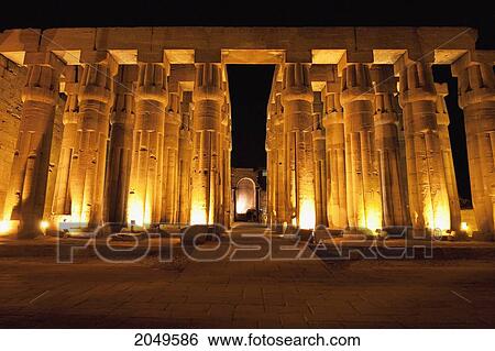 Stock Photograph - Hypostyle Hall Of Amenhotep Iii And Apse Of The Chapel For The Roman Imperial Cult In The Luxor Temple At Night, Qina, Egypt. Fotosearch