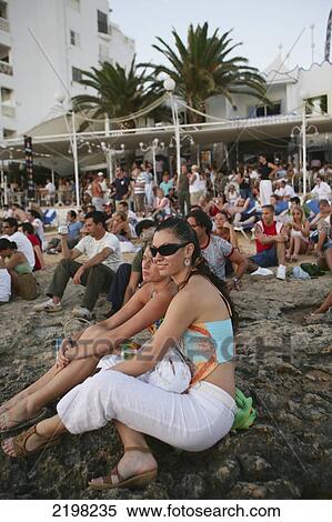 Ibiza, Mambo; San Antonio, People watching sunset outside Cafe Del Mar View Large Photo Image Stock Photography - Ibiza, Mambo; San Antonio, People watching sunset outside Cafe Del Mar. Fotosearch