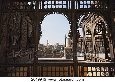 Stock Photography - Ibn Tulun Mosque, As Seen Through A Wooden Mashrabeya Screen On The Roof Terrace Of The Gayer Anderson Museum, Cairo, Al Qahirah, Egypt. Fotosearch