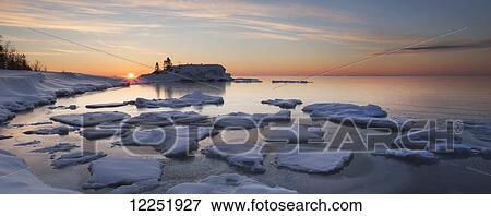 Ice chunks on Lake Superior at sunrise; Grand Portage, Minnesota, United States of America View Large Photo Image Stock Photo - Ice chunks on Lake Superior at sunrise; Grand Portage, Minnesota, United States of America. Fotosearch