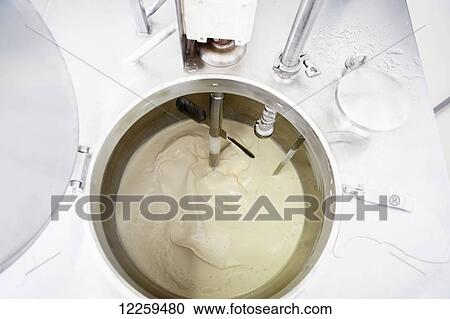 Stock Image - Ice cream making; Baltimore, Maryland, United States of America. Fotosearch