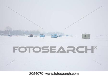 Stock Image - Ice Fishing Huts, Ile De Perrot, Quebec.. Fotosearch