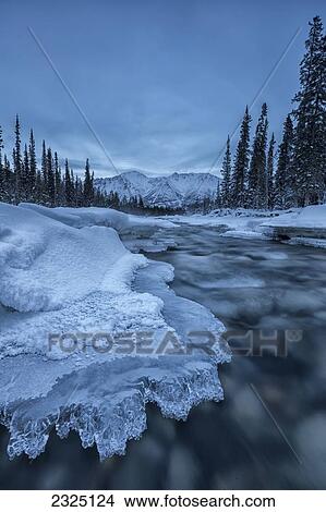 Picture - Ice Forms On The Wheaton River Near Whitehorse; Yukon Canada. Fotosearch
