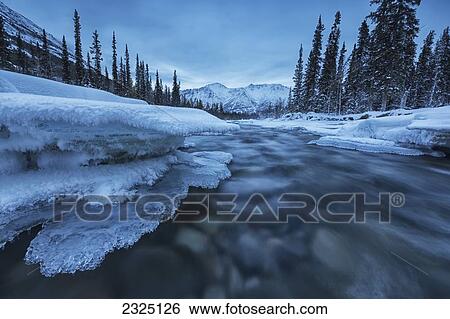 Stock Photograph - Ice Forms On The Wheaton River Near Whitehorse; Yukon Canada. Fotosearch