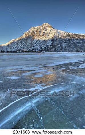 Stock Image - Ice On Rose Lake At Sunrise, Kusawa Lake Territorial Park, Yukon. Fotosearch