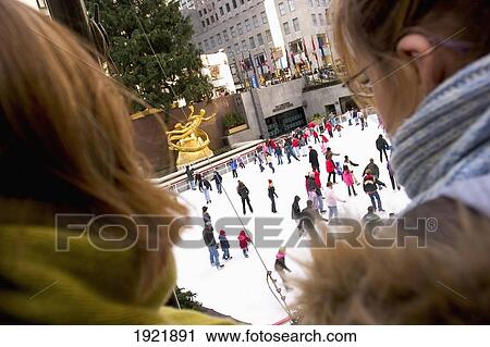 Stock Image - Ice Skating At Rockefeller Center. Fotosearch
