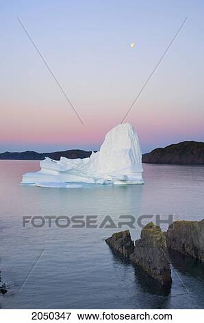 Iceberg At Dawn In Trinity Bay Off The Bonavista Peninsula Of Eastern Newfoundland View Large Photo Image Stock Photo - Iceberg At Dawn In Trinity Bay Off The Bonavista Peninsula Of Eastern Newfoundland. Fotosearch