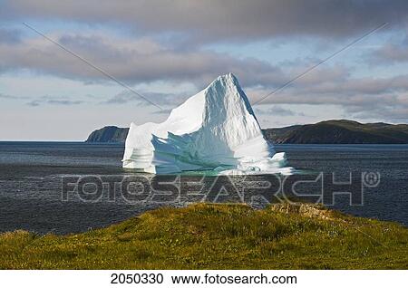 Iceberg Floats In Trinity Bay Off The Bonavista Peninsula Of Eastern Newfoundland View Large Photo Image Stock Image - Iceberg Floats In Trinity Bay Off The Bonavista Peninsula Of Eastern Newfoundland. Fotosearch