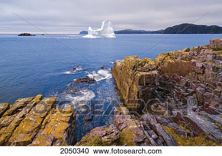 Iceberg Floats In Trinity Bay Off The Bonavista Peninsula Of Eastern Newfoundland View Large Photo Image Stock Image - Iceberg Floats In Trinity Bay Off The Bonavista Peninsula Of Eastern Newfoundland. Fotosearch