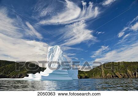 Stock Image - Iceberg Floats In Trinity Bay Off The Bonavista Peninsula Of Eastern Newfoundland. Fotosearch