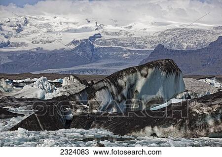 Icebergs clog the lagoon at Jokulsarlon as they calf off of the Vatnajokull ice cap; Iceland View Large Photo Image Stock Image - Icebergs clog the lagoon at Jokulsarlon as they calf off of the Vatnajokull ice cap; Iceland. Fotosearch