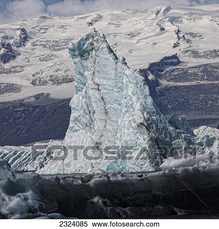 Stock Photography - Icebergs clog the lagoon at Jokulsarlon as they calf off of the Vatnajokull ice cap; Iceland. Fotosearch