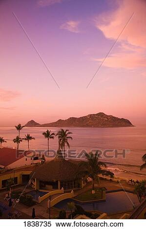 Idillic View Of Holiday Resort At Dawn; Mazatlan, Sinaloa State, Mexico View Large Photo Image Stock Photography - Idillic View Of Holiday Resort At Dawn; Mazatlan, Sinaloa State, Mexico. Fotosearch