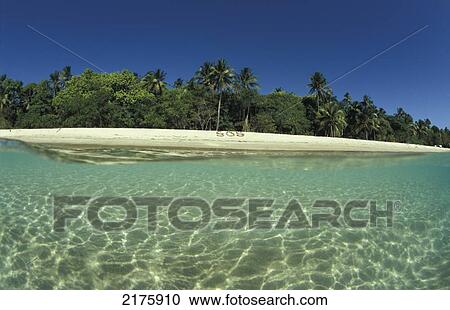 Stock Image - Idyllic Beach Seen From Sea. Fotosearch