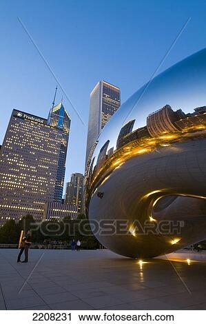 Illinois Chicago Bean Sculpture In Millennium Park At Dusk, City And Buildings Reflected In Modern Metal Public Art, Couple Hug In Plaza View Large Photo Image Stock Image - Illinois Chicago Bean Sculpture In Millennium Park At Dusk, City And Buildings Reflected In Modern Metal Public Art, Couple Hug In Plaza. Fotosearch