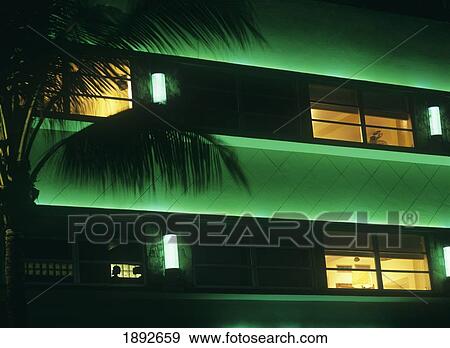 Stock Photo - Illuminated Building Exterior On Ocean Drive. Fotosearch