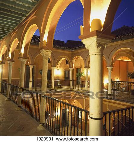 Stock Image - Illuminated Courtyard Of Alhambra. Fotosearch