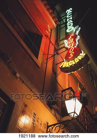 Illuminated Sign In Barrio View Large Photo Image Stock Photo - Illuminated Sign In Barrio. Fotosearch