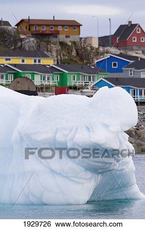 Stock Photograph - Ilulissat As Seen From A Midnight Cruise Around The Ilulissat Ice Fjord, One Of Unesco World Heritage Sites. Greenland.. Fotosearch