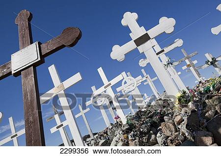 Stock Photograph - Ilulissat Cemetary On The West Coast Of Greenland. The Ground Is So Rocky Many Bodies Are Placed In Scrapes In The Ground And Covered With Stones.. Fotosearch