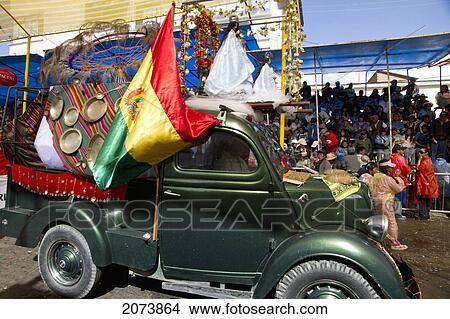 Image Of The Virgin Mary Atop An Old Automobile In The Procession Of The Carnaval De Oruro, Oruro, Bolivia View Large Photo Image Picture - Image Of The Virgin Mary Atop An Old Automobile In The Procession Of The Carnaval De Oruro, Oruro, Bolivia. Fotosearch