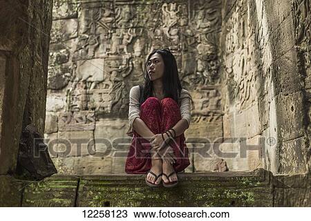 Stock Image - Impressive Buddha's faces in Bayon Wat, built by the king Jayavarman VII in the end of twelfth century, from Angkor; Siem Reap, Cambodia. Fotosearch