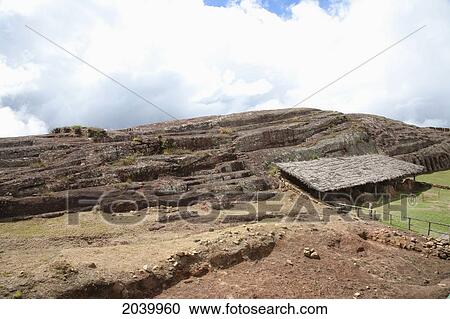 Stock Image - Inca Wall And Temple Of The Sacristy On The Carved Stone Hill Of El Fuerte De Samaipata, Santa Cruz Department, Bolivia. Fotosearch