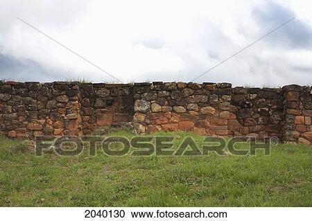 Stock Image - Inca Wall On The Carved Stone Hill Of El Fuerte De Samaipata, Santa Cruz Department, Bolivia. Fotosearch