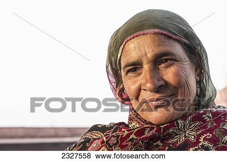 Stock Photo - India, Delhi, cities main place of worship for Muslims; New Delhi, Portrait of Muslim woman from Kashmir at Jama Masjid. Fotosearch