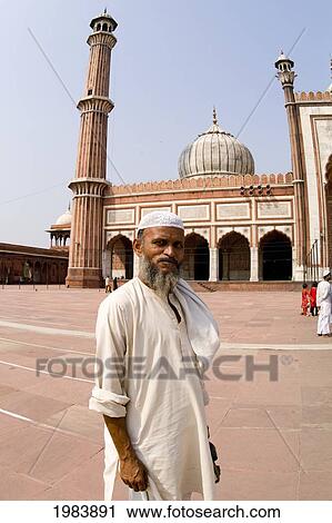 India, Delhi, Jama Masjid, A Man Standing Within The Largest Mosque In The Country. View Large Photo Image Stock Image - India, Delhi, Jama Masjid, A Man Standing Within The Largest Mosque In The Country.. Fotosearch