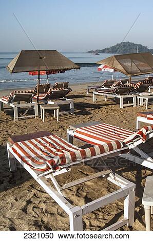 India, Empty Beach Chairs And Parasols On Palolem Beach; Goa View Large Photo Image Stock Image - India, Empty Beach Chairs And Parasols On Palolem Beach; Goa. Fotosearch